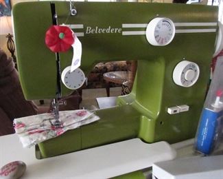 Belvedere sewing machine - very retro and heavy duty. There are also lots of sewing accessories - threads, needles, scissors, knitting needles, vintage buttons plus!