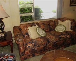 Floral sofa, 2 matching side tables, 2 metal base lamps.