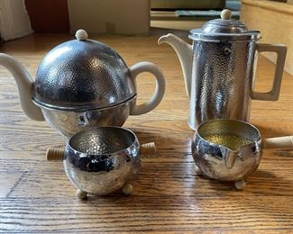 Vintage Mid Century Stamped Metal Tea Set. Photo 1 of 3. Spring Stone Mythical Fish Sculpture / Cigarette Holder. Measures 13" x 7". Photo 1 of 3.