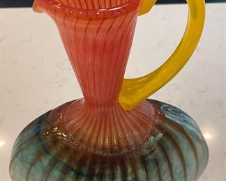 Kjell Engman "Bon Bon" Large Kosta Boda Glass Pitcher. Measures 9" W x 14" H. Photo 2 of 4.