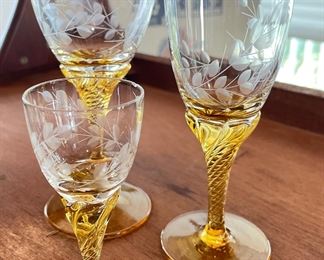 Etched Crystal Stemware with Amber Stems: Set of 5
Set of 6 Water, Set of 5 Wine, Set of 6 Cordials.