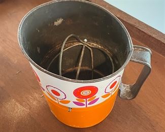 Vintage Orange Metal Flour Sifter. Photo 2 of 2.