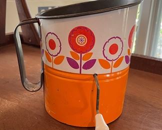 Vintage Orange Metal Flour Sifter. Photo 1 of 2.