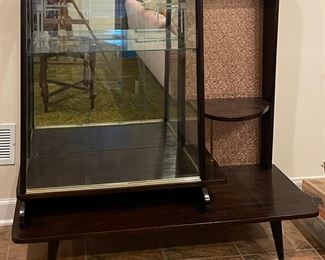 Mid-Century Modern Glass Front Bookcase / Display Case. Measures 46" W x 18" D x 48" H. Photo 1 of 5.