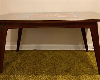 Mid-Century Dining Table with Glass Topper. Lifebouy for Health Advertising Poster is Removable. Measures 60" W x 36" D x 30" H with 27" Clearance. Photo 1 of 3.