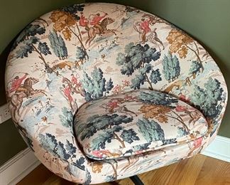 Vintage Mid-Century Modern Bucket Swivel Chair Upholstered in Equestrian Theme. Measures 29" W x 25 D.
