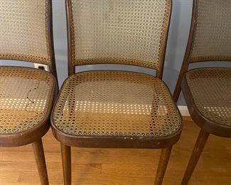 Four caned side chairs