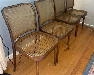 Four caned side chairs