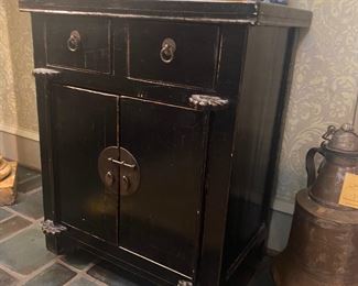 Black lacquered Asian style cabinet