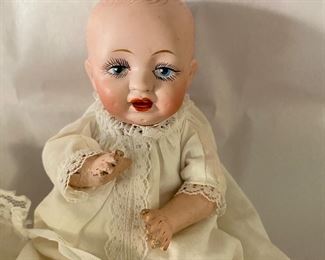 Antique bisque head baby doll