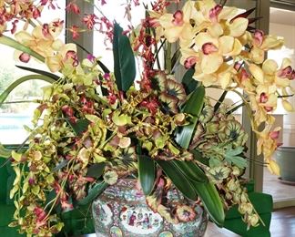 Mid century fish bowl vase with faux florals on a rosewood stand