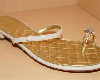 There are several pair of Chanel kitty heels, slides, slingbacks and sandals including this ivory gemstone toe ring pair.