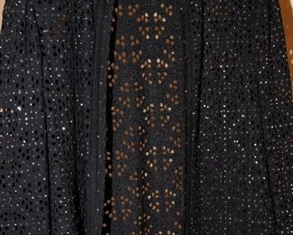 There are many many pieces by St. John, including Couture and Evening, as well as Boutique. See the following photos for details.