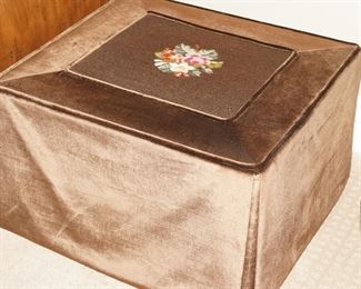 Velvet ottoman with needlepoint center