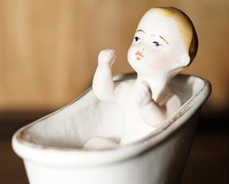 Bisque baby in a bath tub