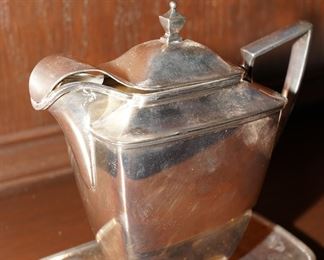 Pewter teapot on tray