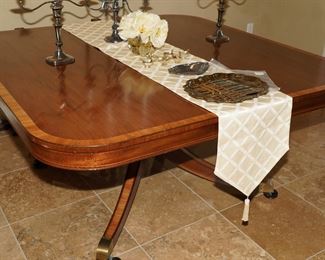 Hand made Kensington inlaid Duncan Phyfe inspired mahogany double pedestal dining table with 12 leaves.