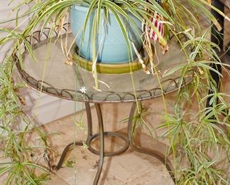 Wrought iron glass topped patio table