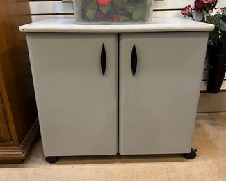 Rolling gray metal cabinet