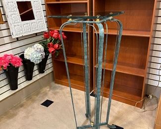 Metal plant stand with thick glass top.  Heavy!