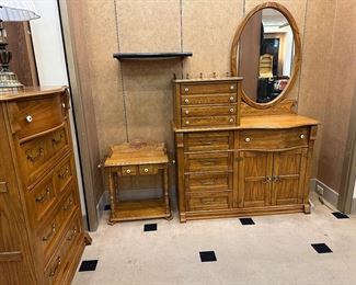 Pulaski oak dresser with mirror, 5 drawer chest, and nightstand.  Sold separately 