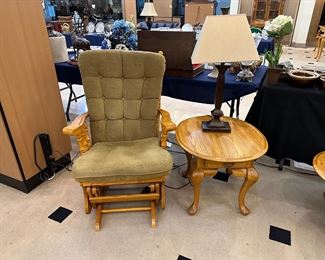 Brown cushion oak glider rocker