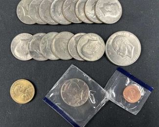 (15) JFK Half Dollars, (1) Ike & (1) Sacagawea $