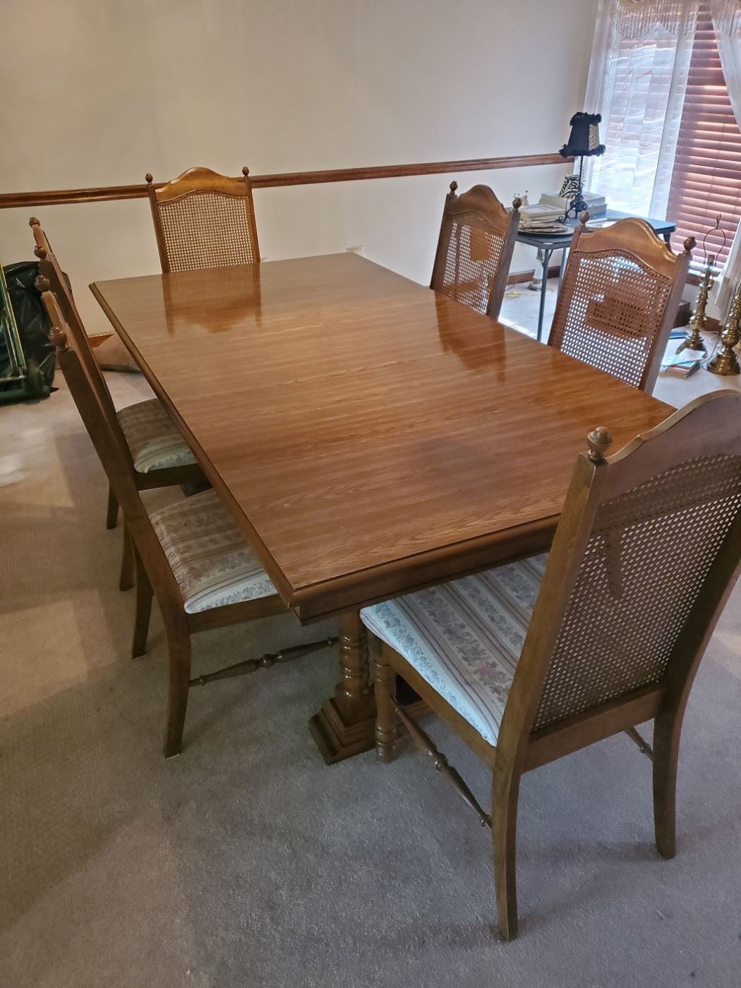 Utterly astounding vintage (circa 1994) dining table, literally in “just came off the Goldsmith’s furniture showroom floor day before yesterday” condition!  Includes the six chairs shown.  Main top is 42 x 62, plus an 18” leaf (shown with leaf.)  $250.  