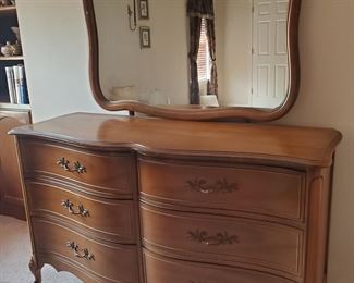 Great vintage (early 90s) chest of drawers / low boy dresser in great condition!  Chest is 56 x 18 x 34, mirror is 42 by 32.  $225.  