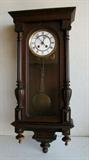 C/1890's Walnut cased German wall Regulator Clock, porc. dial, carved columns, 30" h., needs hairspring replaced