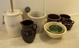 C/1920 3 gallon Red Wing signed open crock ~ C/1900 Albany slip glaze lg. stoneware pitcher ~ C/1900 Lg. yellow batter stoneware bowl ~ C/1910 Albany slip 1 gallon open crock ~ C/1910 2 qt. green ribbed stoneware batter bowl ~ Etc