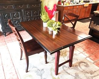Drop-leaf table perfect for extra seating or as a console table