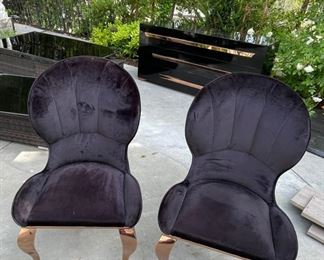 two black velvet chairs