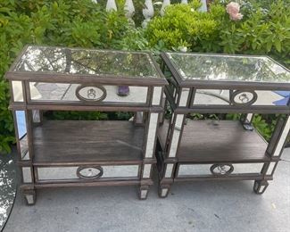 two glass bed side tables with brown accent