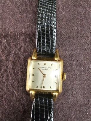 https://www.auctionninja.com/hewitt-estates-and-antiques/product/vintage-1950s-rounds-patek-phillipe-company-square-ladies-watch-high-end-timepiece--1912.html