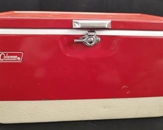 https://www.auctionninja.com/hewitt-estates-and-antiques/product/vintage-coleman-metal-cooler-1878.html