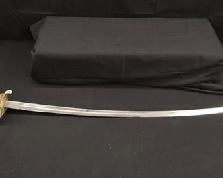 https://www.auctionninja.com/hewitt-estates-and-antiques/product/u-s-marine-corps-official-dress-sword-1930.html