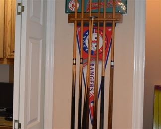 Pool cues and holder, sports memorabilia 