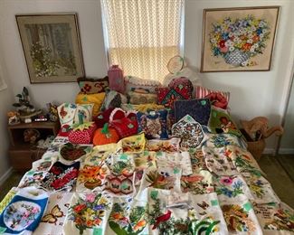 Bdrm 1 Crafters: Hand-made crochet and kneedlepoint treasures on bed and walls