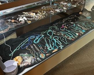 DISPLAY CASE FULL OF JEWELRY