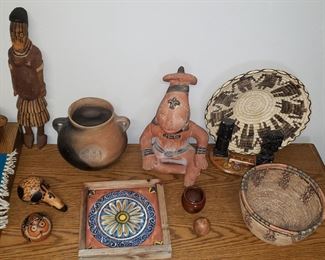Mexican, Mayan and Native American pottery 
Handmade baskets by Papago Indians of Arizona