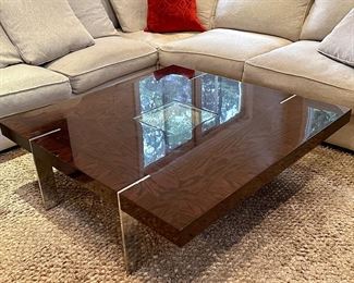 High-Gloss Coffee Table with Chrome Legs and Glass Center Accent