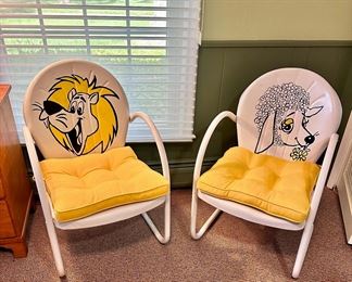 Vintage metal hand painted chairs with cushions.