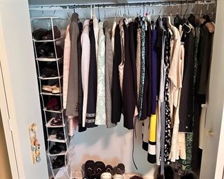 4 closets filled with ladies shoes and clothing.