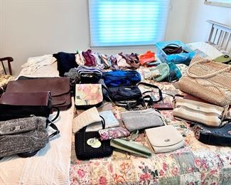 A variety of handbags, scarves, belts and accessories.