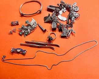 Sterling silver jewelry, including a loaded charm bracelet!