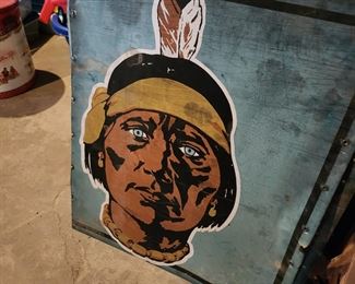 There are two of these tin signs from a trucking company