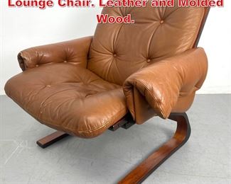 Lot 2 RYKKEN Made in Norway Lounge Chair. Leather and Molded Wood. 