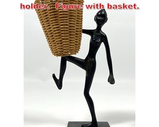 Lot 51 Hagenauer Style match holder. Figure with basket. 