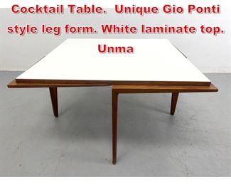 Lot 72 A Good Unique Design Coff Cocktail Table. Unique Gio Ponti style leg form. White laminate top. Unma